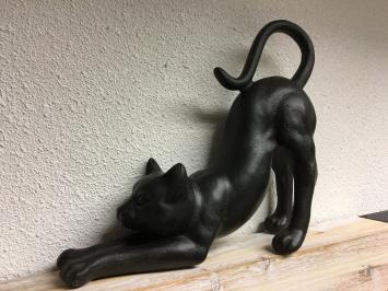 Sculptuur van een kat die zich uitstrekt