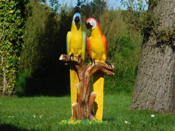 Beeld papegaaien op boomstronk, polystone, in kleur