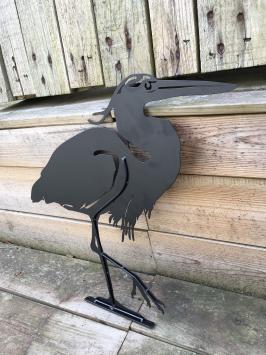 Prachtig silhouette van een reiger, mat zwart metaal